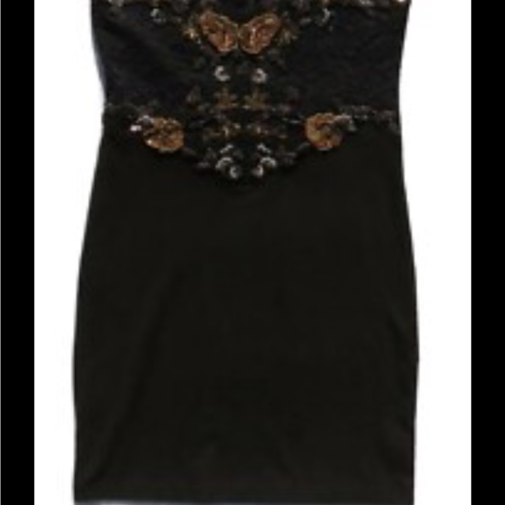 Free people black and brown  embroidered dress. Size medium